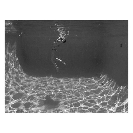 Photo of Sonja Kinski diving into the water.